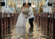 Wet wedding ‘just a test’: Filipino couple ties knot in flooded church during typhoon