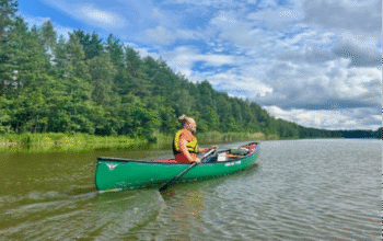 Paddle power: wilderness guide Simo Peri in his canoe. Photograph: Jacob Little