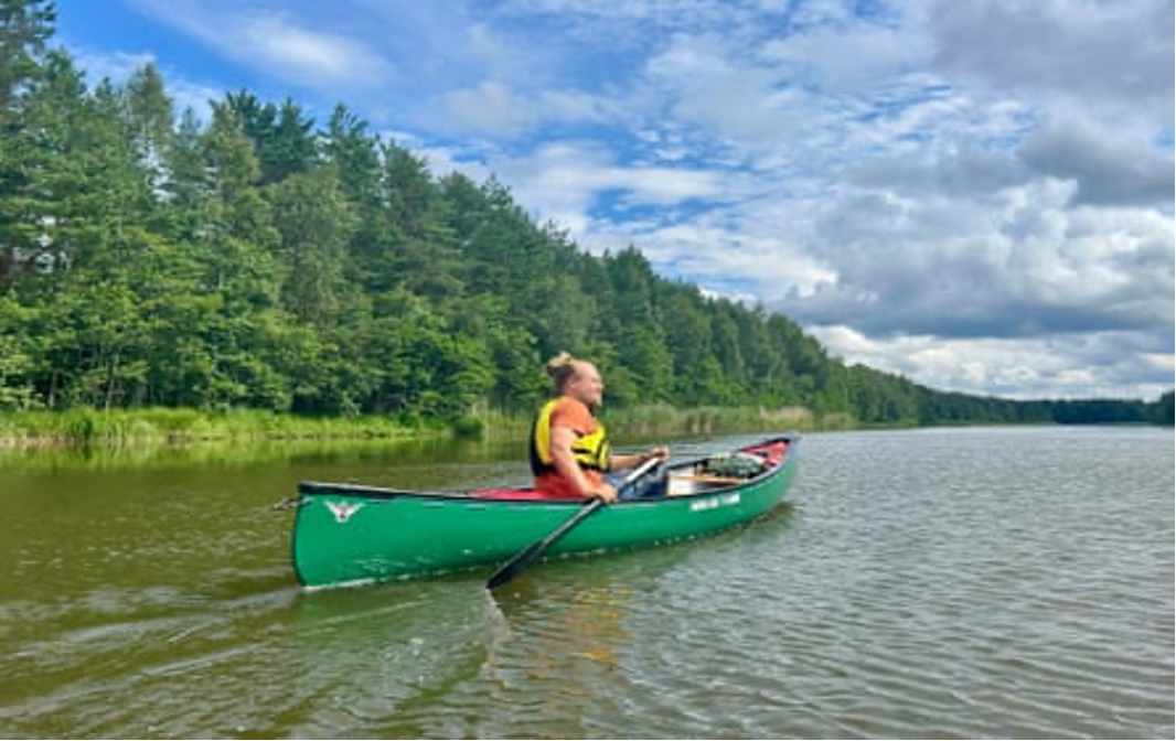 Paddle power: wilderness guide Simo Peri in his canoe. Photograph: Jacob Little
