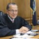 FILE - In this Aug. 10, 2017 file photo, Providence Municipal Court Judge Frank Caprio sits on the bench in Providence, R.I. (AP Photo/Michelle R. Smith, File)