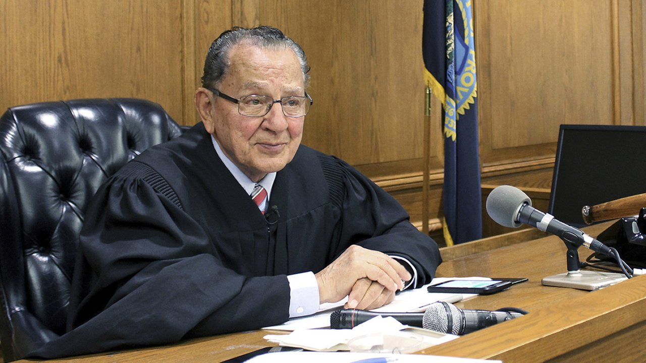 FILE - In this Aug. 10, 2017 file photo, Providence Municipal Court Judge Frank Caprio sits on the bench in Providence, R.I. (AP Photo/Michelle R. Smith, File)